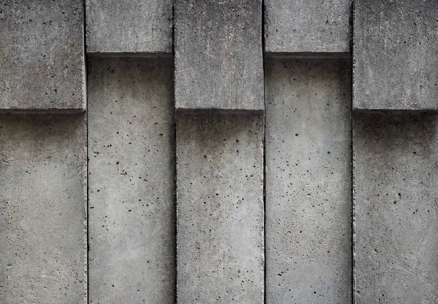 Textura gris de hormigón y sombras sutiles.